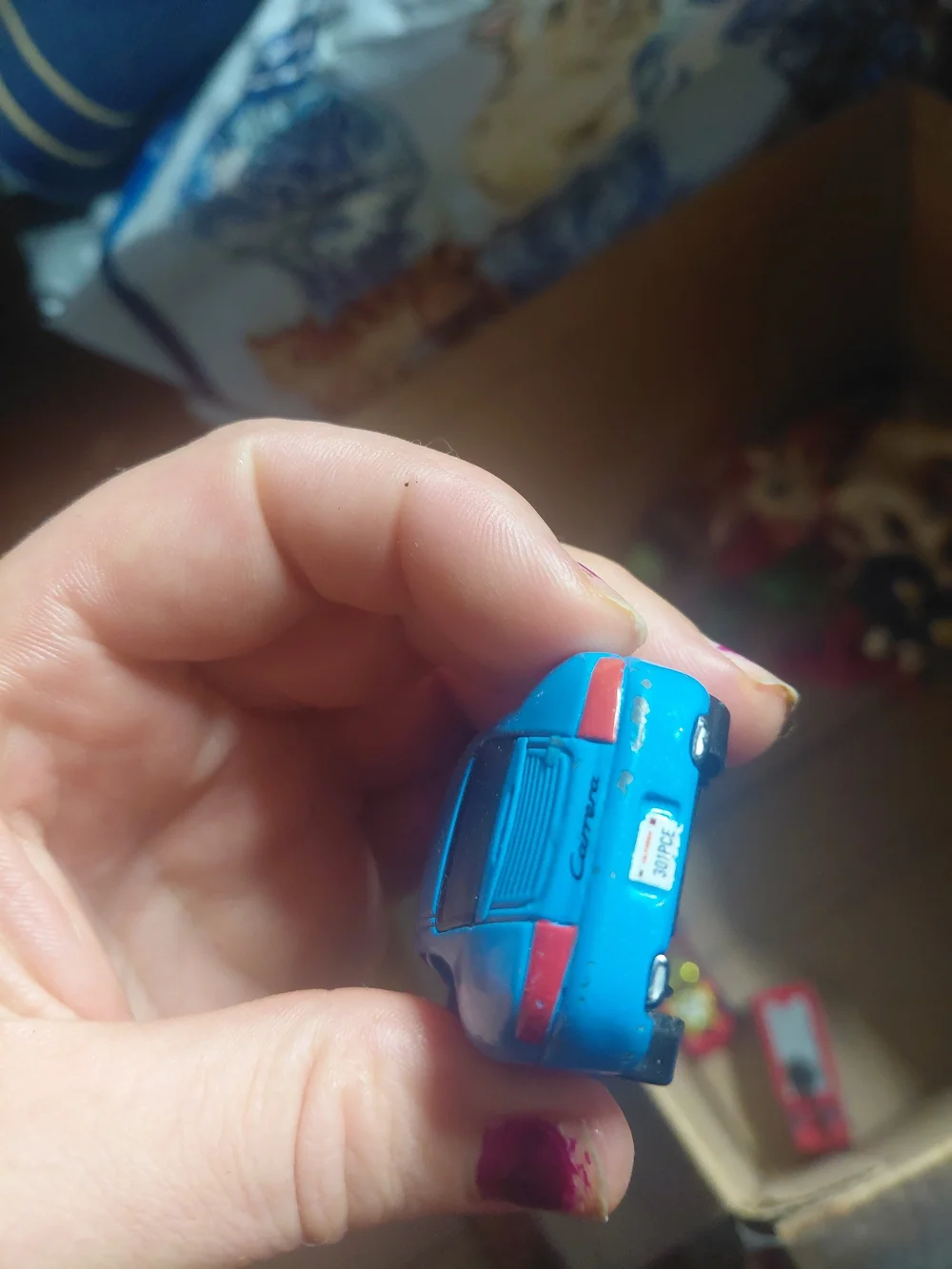 Disney Pixar Cars Sally Carrera diecast toy car.